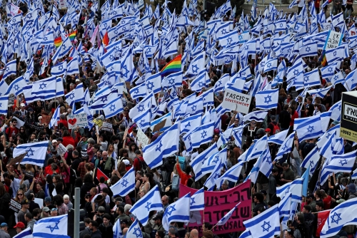 Netanyahu pauses judicial reform in strike-stricken Israel