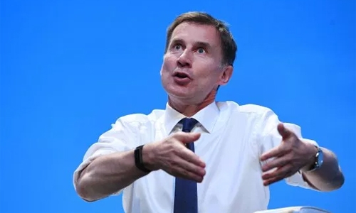 Hunt urges Johnson not to be ‘coward’