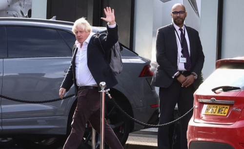 Boris Johnson arrives back in Britain to attempt rapid political comeback