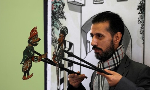 Syria’s last shadow puppeteer hopes to save his art Syria’s last shadow puppeteer hopes to save his art