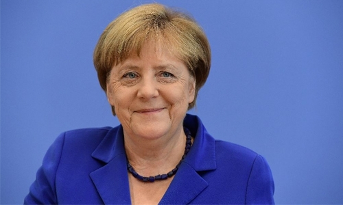 Defiant Merkel defends refugee stance