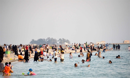 Bahrainis and expatriates flock to public beaches to beat the heat