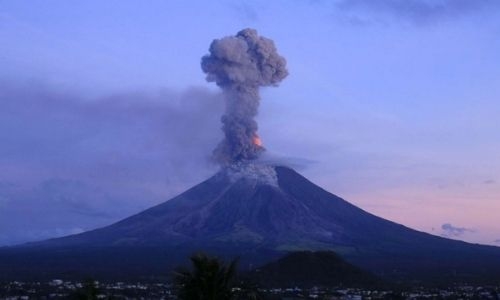 Philippine volcano spews ash and steam, evacuation underway