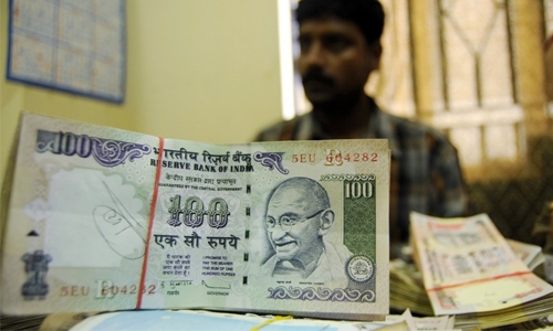 India's central bank cuts key interest rate