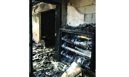 Four injured after fire breaks out in a building Four injured after fire breaks out in a building