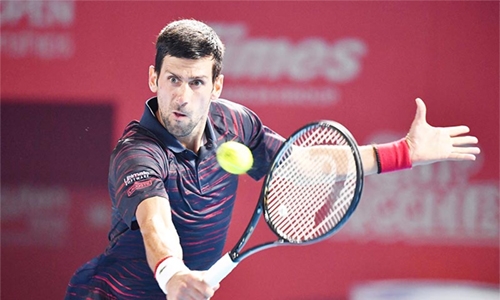 Djokovic advances to Tokyo quarters