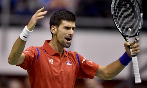 Djokovic beaten in doubles as Serbia slump Djokovic beaten in doubles as Serbia slump