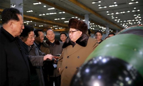 N. Korea fires missiles, liquidates South assets