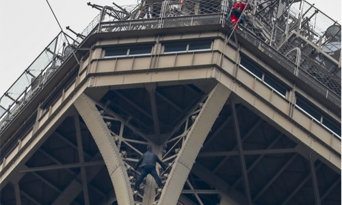 Eiffel Tower climber grabbed after sparking evacuation