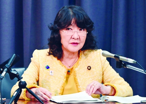 Japan govt approves record budget, including for defence