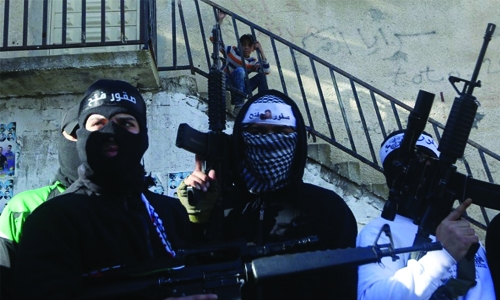 Four dead as Palestinian police clash with gunmen