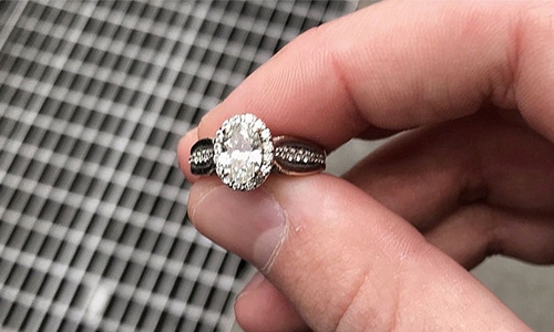 Couple reunited with engagement ring dropped in sewer
