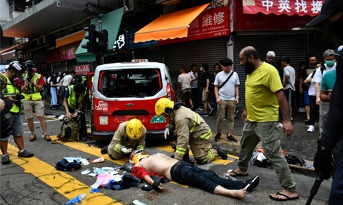 Petrol bombs, tear gas rock Hong Kong