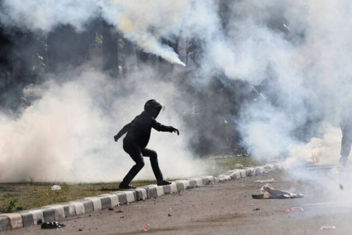 Indonesian Police Use Tear Gas During Protest Over Motorcycle Driver’s Death Indonesian Police Use Tear Gas During Protest Over Motorcycle Driver’s Death