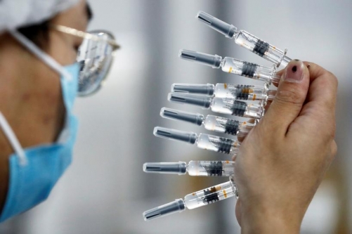 China in talks with WHO over its COVID-19 vaccines’ global use
