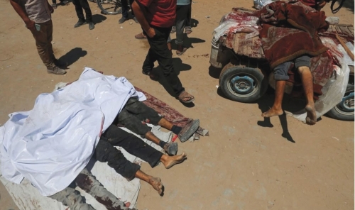 At Least 93 Palestinians Killed While Waiting for Aid in Northern Gaza At Least 93 Palestinians Killed While Waiting for Aid in Northern Gaza