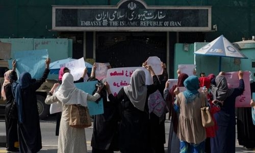 Taliban fire into air to disperse women’s rally backing Iran protests