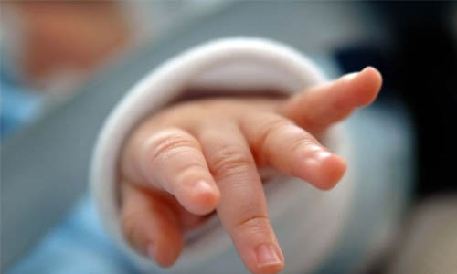 Indian baby survives being buried alive by teen mother Indian baby survives being buried alive by teen mother