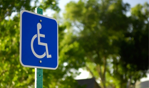 Foreign guards ‘cash in’ on disabled parking