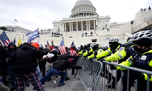US Capitol riot: Police officer dies following clash with pro-Trump mob