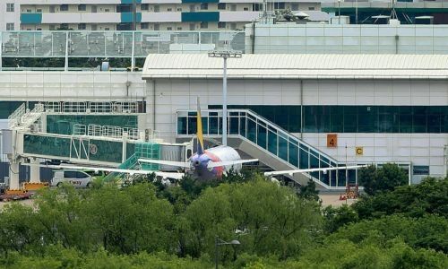 Asiana Airlines bans some emergency seats after door-opening accident Asiana Airlines bans some emergency seats after door-opening accident