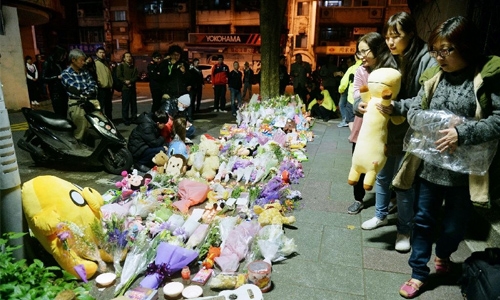 Taiwan beheading suspect beaten by angry mob