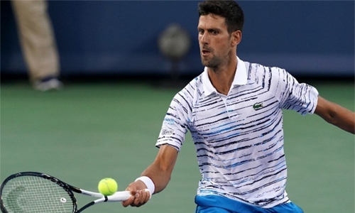 Djokovic motors into quarters Djokovic motors into quarters