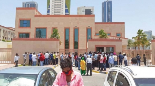 Crowd flouts social distancing rules outside Embassy