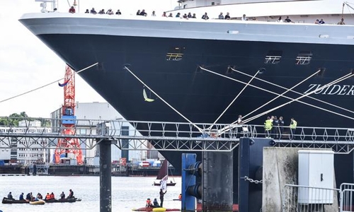 Climate activists blockade cruise ship in German port