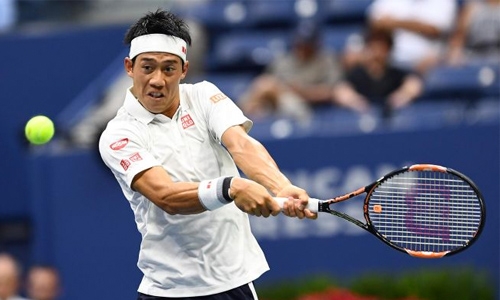 Nishikori survives dogfight, urges Davis Cup revamp Nishikori survives dogfight, urges Davis Cup revamp