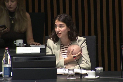Swedish minister breaks ground bringing baby to EU talks