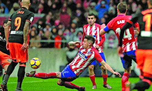 Correa sends Atletico past Valencia Correa sends Atletico past Valencia