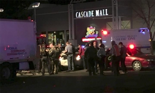 Gunman on the run after shooting dead three at Washington mall Gunman on the run after shooting dead three at Washington mall