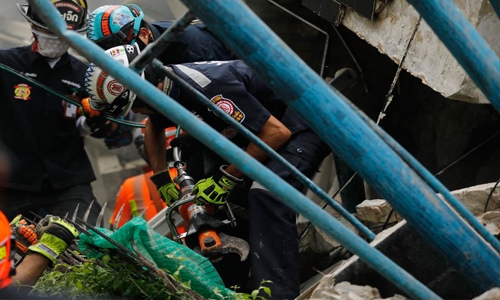 Bangkok home collapses after fire; 3 dead, several trapped Bangkok home collapses after fire; 3 dead, several trapped