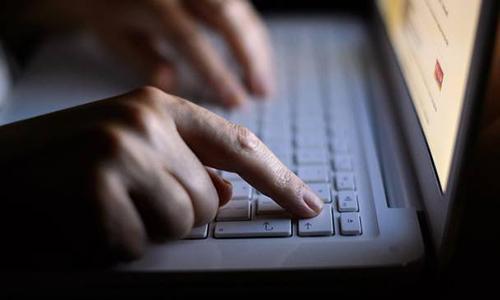 Britain to unveil new online spying laws