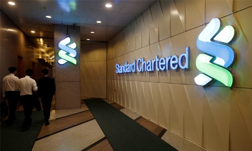 StanChart to take $160 million charge from private equity sale
