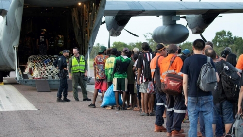 Military evacuates more than 100 Australians as flood looms