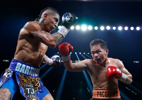 Pacquiao held to draw by Barrios in world title return