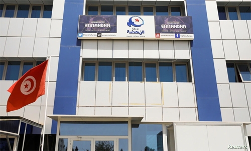 Tunisia puts Ennahda official under house arrest, colleague says
