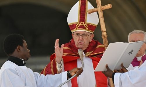 Pope presides over Palm Sunday after hospital stay