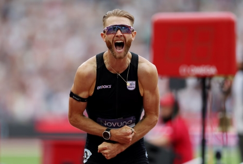 Kerr rewrites history with record-breaking mile run Kerr rewrites history with record-breaking mile run