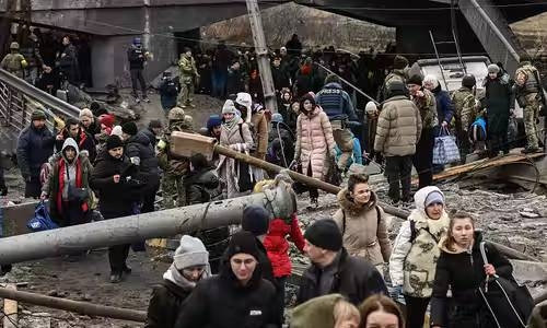  Syrian and Ukrainian refugees should receive 'same treatment', says UN commission chair