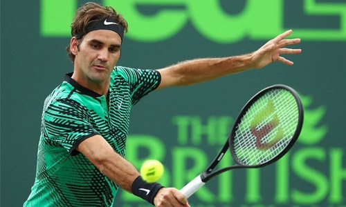 Federer, Wawrinka advance in Miami