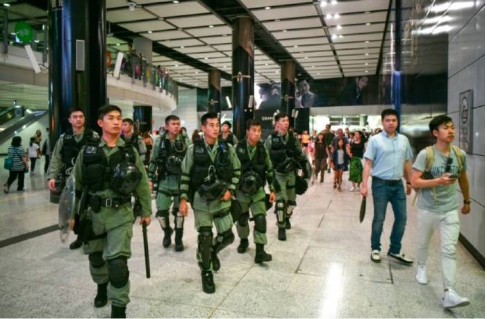 Riot police thwart Hong Kong airport protest