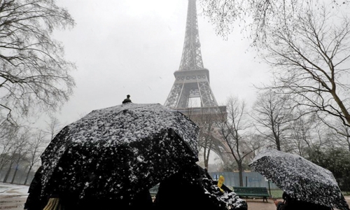 Snow shuts Eiffel Tower as winter blast hits France Snow shuts Eiffel Tower as winter blast hits France