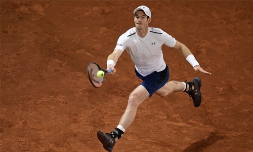 Murray bows out as Nadal, Djokovic march on in Madrid