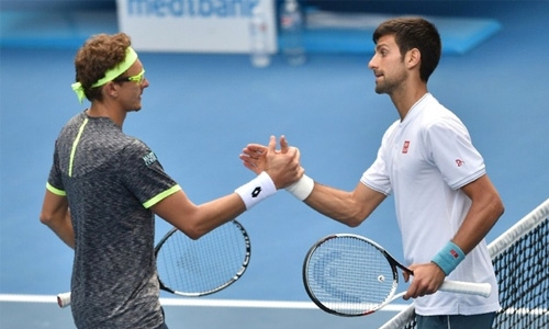 Defending champ Djokovic stunned by Istomin