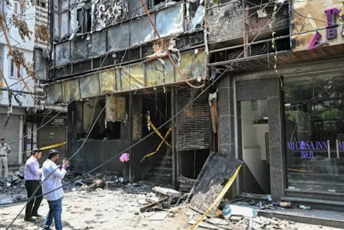 Indian police arrest hotel owner after deadly fire 