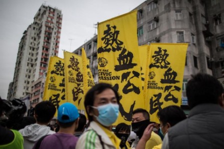 Hong Kong woman jailed for attacking police with breast