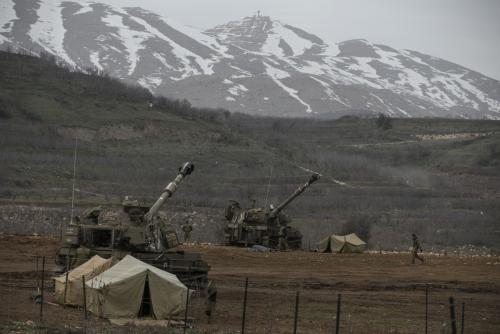 Israel targets Syria army posts after rockets hit Golan
